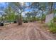 Open lot with tire and wood barriers, perfect for outdoor recreation at 14181 Se 211Th Court, Umatilla, FL 32784