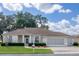 House exterior showcasing landscaping and driveway at 2515 Nw 53Rd Avenue Rd, Ocala, FL 34482