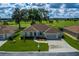 One story home with golf course view, and driveway at 2515 Nw 53Rd Avenue Rd, Ocala, FL 34482