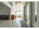 Bright sunroom with tiled floors, plenty of windows, and seating at 2515 Nw 53Rd Avenue Rd, Ocala, FL 34482