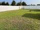 Spacious backyard with a white vinyl fence at 4852 Sw 144Th St, Ocala, FL 34473
