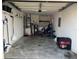 Garage with washer, dryer, and ample storage shelving at 4852 Sw 144Th St, Ocala, FL 34473