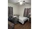 Bright bedroom featuring a comfortable bed and ample floor space at 4852 Sw 144Th St, Ocala, FL 34473