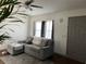 Living room with grey sectional sofa, ottoman, and wood-look floors at 4852 Sw 144Th St, Ocala, FL 34473