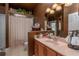 Bathroom with shower, single vanity, and toilet at 10411 Sw 52Nd Ct, Ocala, FL 34476