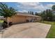 Attached garage with concrete driveway at 10411 Sw 52Nd Ct, Ocala, FL 34476