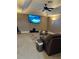 Spacious Gathering room with a large TV, comfortable seating, and a ceiling fan at 10411 Sw 52Nd Ct, Ocala, FL 34476
