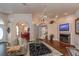 Living area with hardwood floors and fireplace at 10411 Sw 52Nd Ct, Ocala, FL 34476