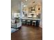 Modern kitchen with island and breakfast bar at 10411 Sw 52Nd Ct, Ocala, FL 34476