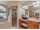 Elegant bathroom with double vanity, shower, and soaking tub at 10411 Sw 52Nd Ct, Ocala, FL 34476