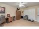 Spacious bedroom with a desk and large closet at 10411 Sw 52Nd Ct, Ocala, FL 34476