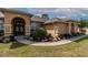Landscaped walkway leading to the house entrance at 10411 Sw 52Nd Ct, Ocala, FL 34476