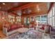 Living Room with access to backyard and water view at 22649 Ne 105Th Avenue Rd, Fort Mc Coy, FL 32134