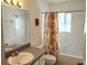Bathroom with shower, toilet, and vanity with sink at 5958 Sw 102Nd Ln, Ocala, FL 34476