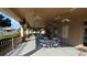 Covered patio with seating for outdoor enjoyment at 5958 Sw 102Nd Ln, Ocala, FL 34476