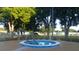 Relaxing community hot tub surrounded by trees at 5958 Sw 102Nd Ln, Ocala, FL 34476