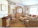 Living room showcases light wood furniture and a cozy atmosphere at 5958 Sw 102Nd Ln, Ocala, FL 34476