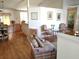 Open living and dining area with hardwood floors and comfortable seating at 5958 Sw 102Nd Ln, Ocala, FL 34476