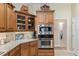 Bright kitchen with stainless steel appliances and wood cabinets at 3051 Sw 41St Pl, Ocala, FL 34474