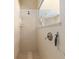Walk-in shower with glass enclosure and built-in shelving at 3051 Sw 41St Pl, Ocala, FL 34474