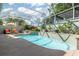 Relaxing kidney-shaped pool, screened enclosure, and lounge chairs at 3051 Sw 41St Pl, Ocala, FL 34474