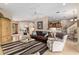 Open living room with a cozy seating area and views into other rooms at 3051 Sw 41St Pl, Ocala, FL 34474