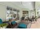 Comfortable patio with wicker furniture and pool view at 3051 Sw 41St Pl, Ocala, FL 34474