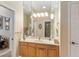 Bathroom with large vanity and mirrored medicine cabinet at 3051 Sw 41St Pl, Ocala, FL 34474