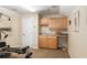 Well-organized gym storage with cabinets and sink at 3051 Sw 41St Pl, Ocala, FL 34474