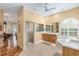 Spa-like bathroom with double vanity, soaking tub, and walk-in shower at 3051 Sw 41St Pl, Ocala, FL 34474