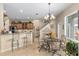 Eat-in kitchen with a breakfast nook and wood cabinets at 3051 Sw 41St Pl, Ocala, FL 34474