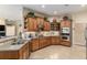 Modern kitchen with ample counter space and wood cabinets at 3051 Sw 41St Pl, Ocala, FL 34474