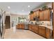 Large kitchen with stainless steel appliances and an island at 3051 Sw 41St Pl, Ocala, FL 34474