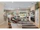 Living room featuring a fireplace and built-in shelving at 3051 Sw 41St Pl, Ocala, FL 34474