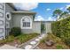 Landscaped side yard with stone pathway and gate at 3051 Sw 41St Pl, Ocala, FL 34474