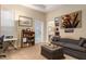 Home office with built-in shelving and comfortable seating at 3051 Sw 41St Pl, Ocala, FL 34474