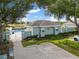 Community pool area with cabana and lounge chairs at 3051 Sw 41St Pl, Ocala, FL 34474