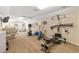 Large home gym with various exercise equipment at 3051 Sw 41St Pl, Ocala, FL 34474