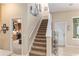 Interior staircase leading to upper level with office view at 3051 Sw 41St Pl, Ocala, FL 34474