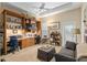 Home office with built-in shelving and two workspaces at 3051 Sw 41St Pl, Ocala, FL 34474