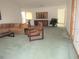 Spacious living room featuring a comfortable seating area and large windows at 9002 Sw 96Th Ln # C, Ocala, FL 34481