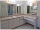 Large bathroom with double vanity and mirror at 9002 Sw 96Th Ln # C, Ocala, FL 34481