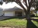 Single story home with a two car garage and mature landscaping at 9002 Sw 96Th Ln # C, Ocala, FL 34481