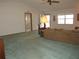 Bright living room with large windows and a comfortable seating arrangement at 9002 Sw 96Th Ln # C, Ocala, FL 34481