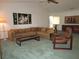 Spacious living room with a large sectional sofa and a coffee table at 9002 Sw 96Th Ln # C, Ocala, FL 34481