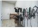Tack room with saddles, bridles, and other equestrian equipment at 10621 Sw 11Th Ter, Ocala, FL 34476
