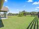 Landscaped backyard with a view of the pasture at 10621 Sw 11Th Ter, Ocala, FL 34476