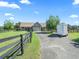 Detached garage with adjacent horse stalls, offering ample storage at 10621 Sw 11Th Ter, Ocala, FL 34476