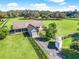 Aerial view of detached garage and horse stalls on a large lot at 10621 Sw 11Th Ter, Ocala, FL 34476