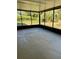 Spacious screened porch overlooking the backyard, perfect for relaxing at 10787 Sw 53Rd Cir, Ocala, FL 34476